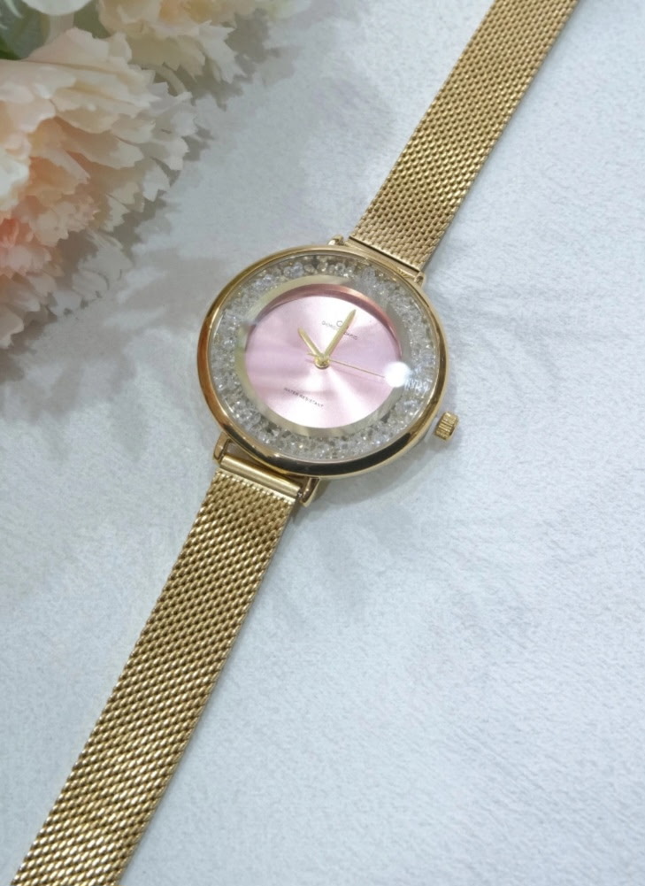 Montre dorée ronde fond rose cristaux bracelet maille