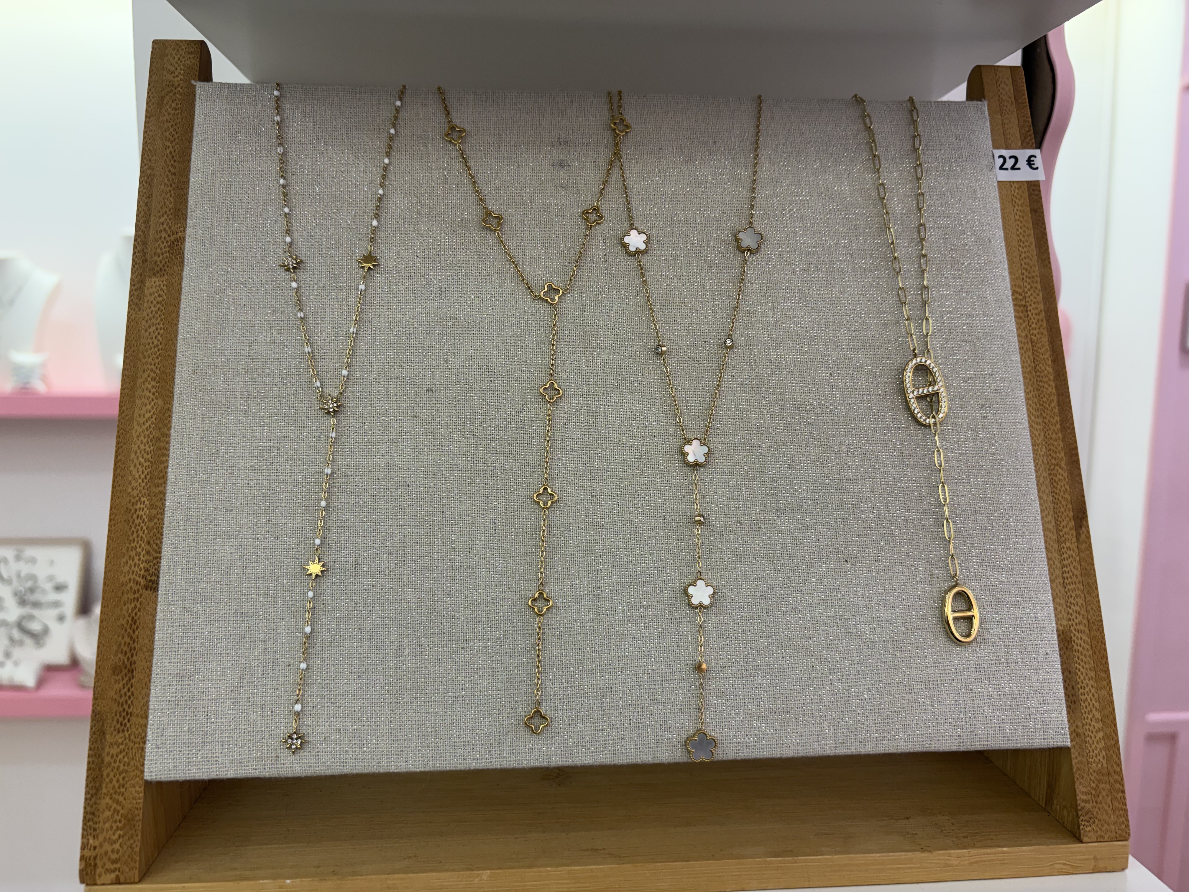 Colliers Y dorés étoiles et trèfles blancs